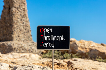 OEP symbol. Concept words OEP Open enrollment period on beautiful black chalk blackboard. Beautiful...