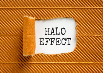 Halo effect and psychological symbol. Concept words Halo effect on beautiful white paper. Beautiful brown paper cardboard background. Business psychological and Halo effect concept. Copy space.
