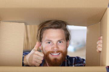 cheerful delightful excited joyful handsome with thumb-up