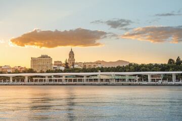 Malaga Skyline with Malaga Cathedral and Paseo del Muelle Uno at sunset - Malaga, Andalusia, Spain