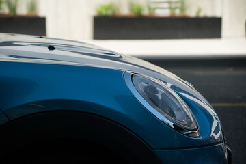 Fototapeta premium Exterior details of small blue sport car in Redmond Town Center