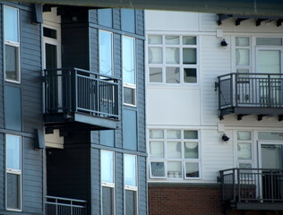 Fototapeta premium Tall windows in new apartment buildings in Redmond town center - 3