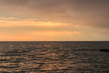 Fototapeta premium Sunset on the Black Sea coast in Abkhazia