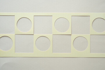 machine-cut stencils featuring circle and square patterns or cutouts