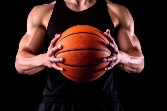 Cropped image of sportsman holding basketball ball isolated on black background. Created with Generative AI tools