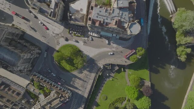 Top down aerial flyover of Bath along River Avon