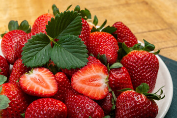 New harvest, board with fresh ripe red sweet Spanish strawberry