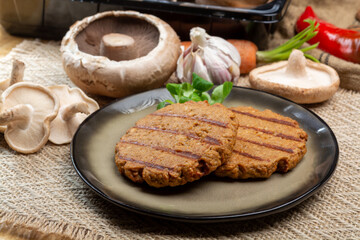 Tasty vegetarian burgers made from healthy quinoa, basil, portobello champignon and shiitake mushrooms