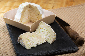 Cheese collection, soft cow French cheese with mold Gaperon artisanal lavored with cracked peppercorns and garlic produced in Auvergne