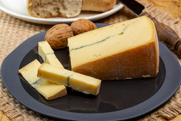Cheese collection, French Morbier semi-soft cow milk cheese with black mold layer