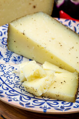 Cheese collection, aged hard Italian sheep cheese black pecorino from Sicily island or pecorino...