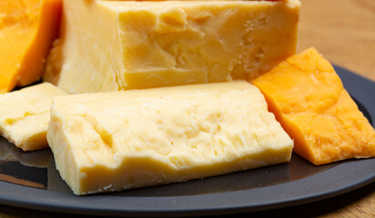 British cheeses collection, Scottish coloured and English matured cheddar cheeses