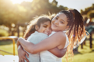 Woman hug young girl outdoor, smile in portrait and love, bonding in park with happiness and care. Relationship, mother and daughter spending quality time together with embrace, affection and family