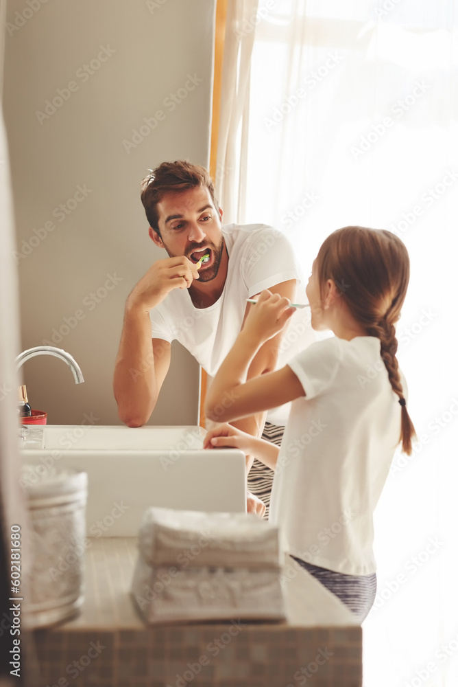 Poster Brushing teeth, father and child learn in a bathroom at home in morning with dental cleaning. Oral hygiene, kids and dad together in a house with bonding and parent love for children with toothbrush