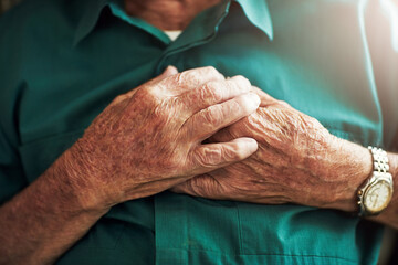Elderly man, hands on chest and heart attack, sick or medical emergency. Pain, cardiology and...