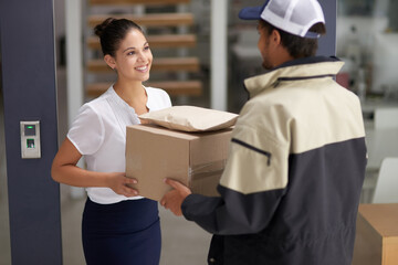 Business, woman and courier with delivery, office and box with shipping, customer and supplier. Female client, male employee or happy entrepreneur with a package, parcel and distribution with service
