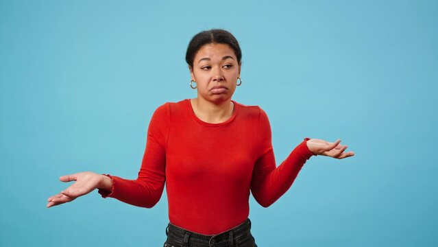 Woman listens carefully and shakes head showing ignorance
