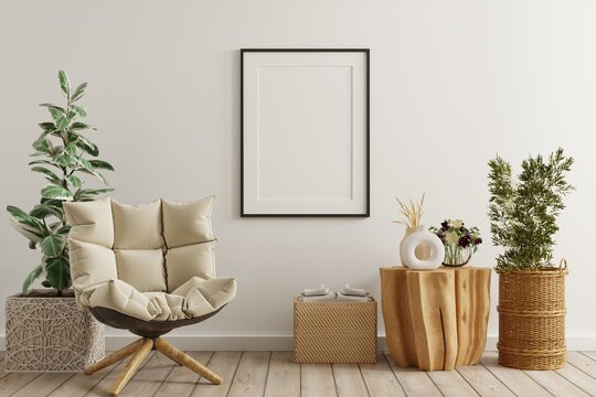 Poster mockup with vertical frames on empty white wall in living room interior with velvet armchair.3d rendering