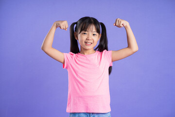 beautiful asian girl portrait posing on purple background