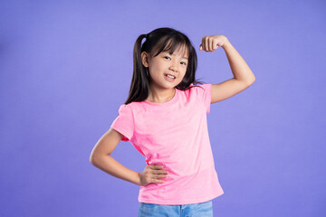 beautiful asian girl portrait posing on purple background