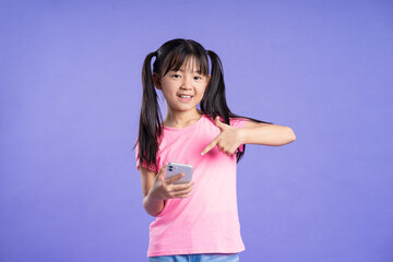 Fototapeta premium beautiful asian girl portrait posing on purple background