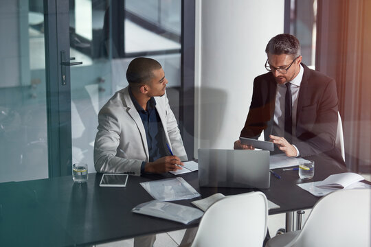 Planning, tablet and business men meeting, advice and consulting for financial help, discussion or review in office. Professional people, leader or accountant on tech behind window reflection