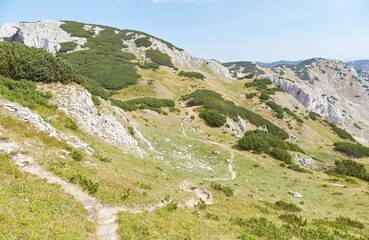 Naklejka premium Hiking to Bobotov Kuk, the highest peak in Montenegro, situated in Durmitor National Park