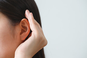 Fototapeta premium Health problems, women have a lot of pain in the ears.