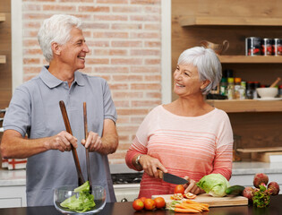 Cooking, health and happy of old couple in kitchen for salad, love and nutrition. Helping, smile and retirement with senior man and woman cutting vegetables at home for food, dinner and recipe