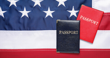 Passports on USA flag. Immigration concept