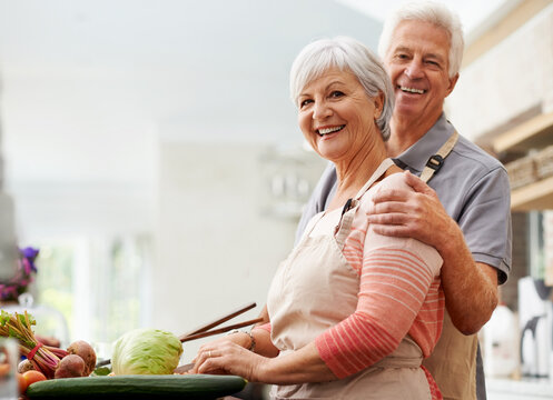 Cooking, nutrition and portrait of old couple in kitchen for salad, love and health. Happy, smile and retirement with senior man and woman cutting vegetables at home for food, dinner or recipe mockup