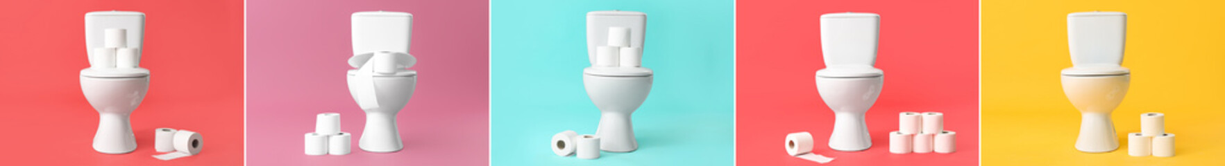 Set of toilet bowls and rolls of paper on color background