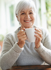 Portrait, happy old woman and cup of coffee in home for break, relaxing morning and retirement....