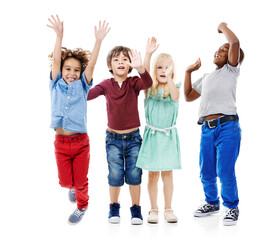 Joy, jumping and portrait of children in studio for diversity, friends and playing. Happiness,...