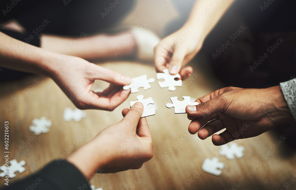 Poster Hands, business people and puzzle in circle, closeup and teamwork for problem solving, solution and game. Group, together and helping hand for jigsaw, solidarity and team building on office floor