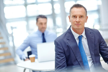 Portrait, corporate and senior man with focus, consultant and leader for marketing company, worker and project manager. Business, mature male and entrepreneur with sales growth, skills and leadership