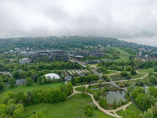 Aerial view of University of Zürich Campus Irchel with public park in the foreground on a cloudy spring morning at City of Zürich. Photo taken May 9th, 2023, Zurich, Switzerland.