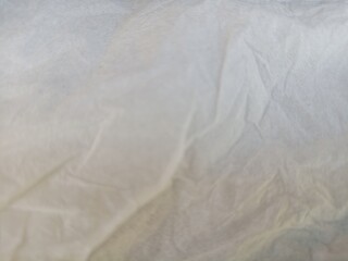 Naklejka premium White Linen background Crumpled tissue Natural handmade tissue background Eco Organic top view White tissue linen texture