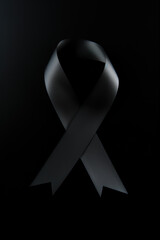 Black mourning ribbon with a dark background. Created with Generative AI Technology