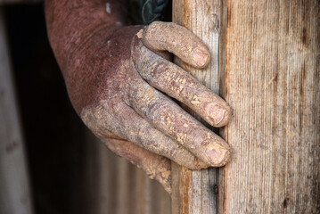 Dirty hands from traces of clay pottery and Close up hands of the traditional pottery making in the old way clay
