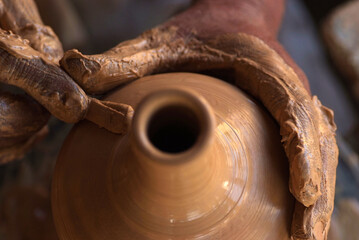 Close up hands of the traditional pottery making in the old way clay
