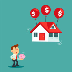 businessman holding small piggy bank look at floating house with dollar sign balloon