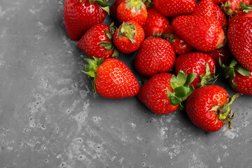 Fresh strawberries on blue background