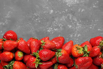 Fresh strawberries on blue background