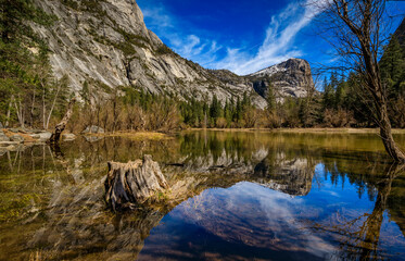 Fototapeta na wymiar Mirror Lake full after snow melt, North Dome reflections, Yosemite National Park