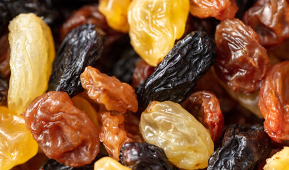 Multicolored raisins as a background. Macro