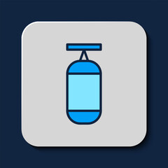 Filled outline Punching bag icon isolated on blue background. Vector