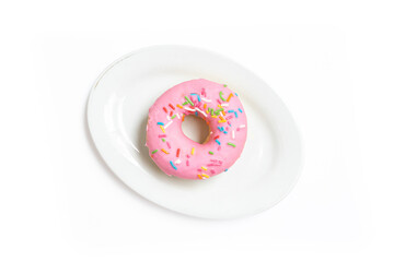 Edited photo. A messy strawberry doughnut on a plate isolated on white background.