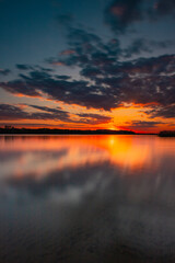 Fototapeta premium sunset over the lake
