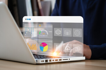 Business strategy concept for the development of the organization. Businessman use laptops to work on virtual smart digital screens, Analyze statistical Marketing data,Data management